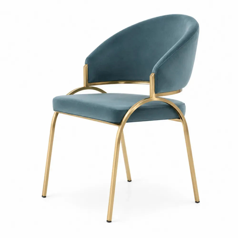 Silla tapizada de comedor asiento y respaldo en terciopelo azul estructura metálica dorada patas de metal diseño curvo sin medidas especificadas