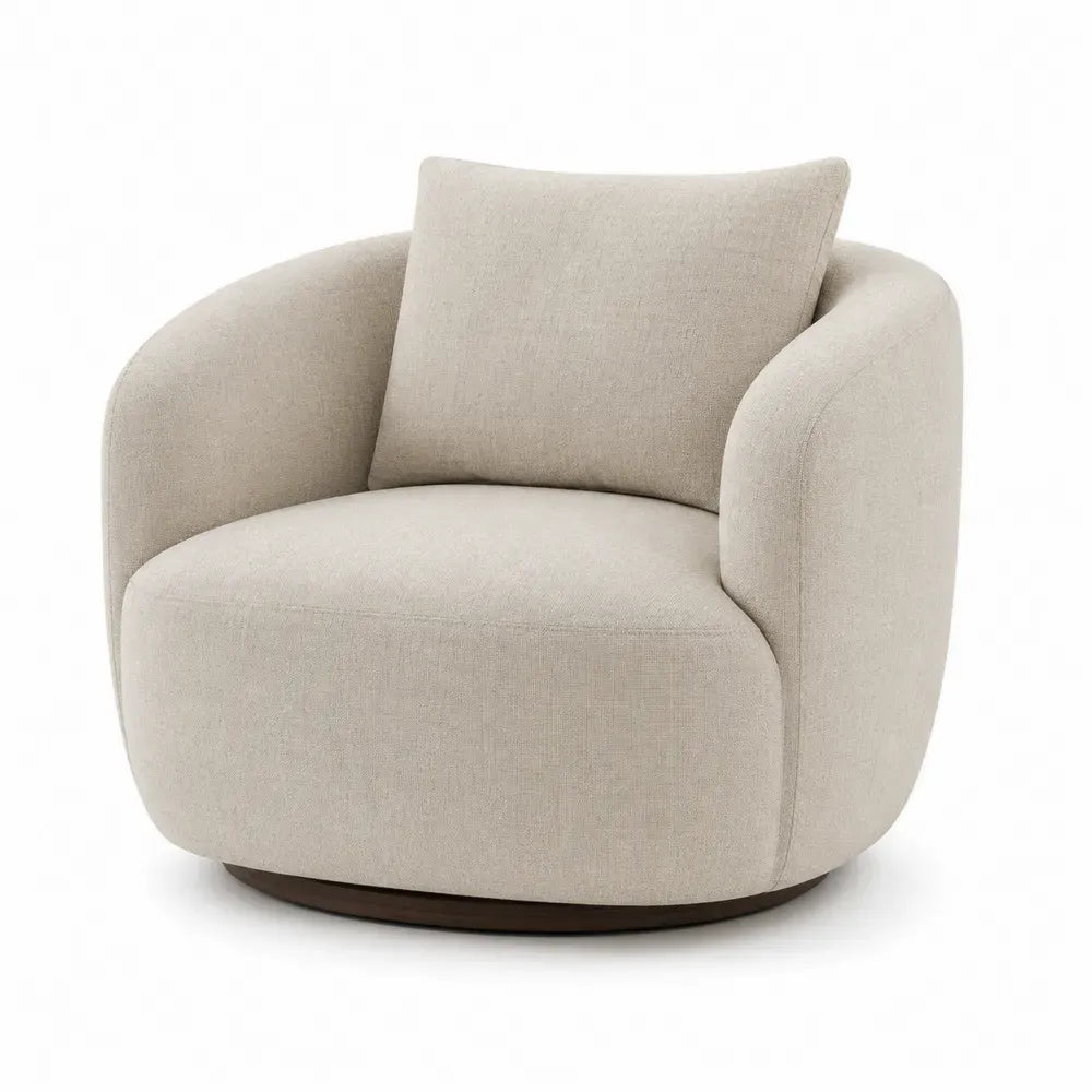 Sillón giratorio tapizado en tejido beige base giratoria de madera forma redonda sin dimensiones especificadas