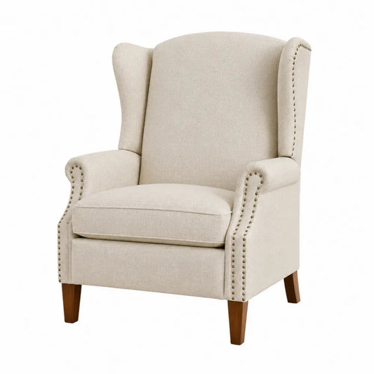 Silla butaca tapizada en tejido beige con respaldo alto orejero estructura de madera patas de madera maciza y tachuelas metálicas sin medidas especificadas